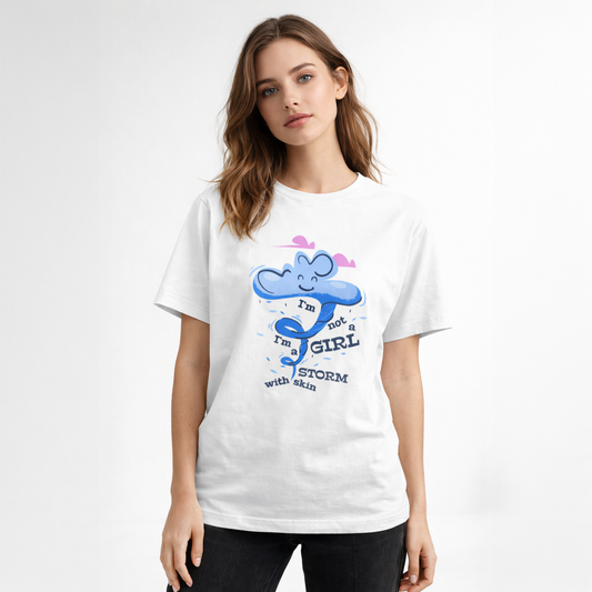 Woman wearing a white t-shirt with a graphic design on a plain background