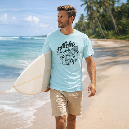 Man walking on a beach holding a surfboard, wearing a light blue t-shirt with 'Aloha Hawaii Surf Rider' text.