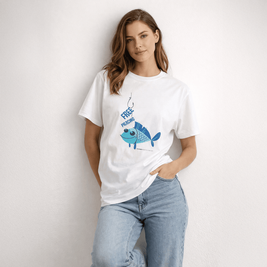 Woman wearing a white t-shirt with a blue fish graphic and text against a plain background
