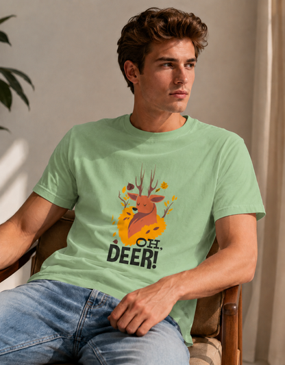 Man wearing a light green t-shirt with a 'Oh Deer!' graphic design.