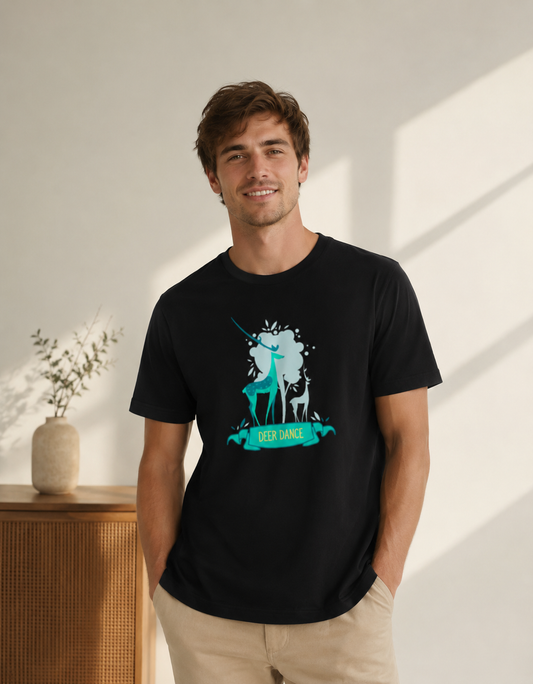 Man wearing a black t-shirt with a graphic design in a bright room.