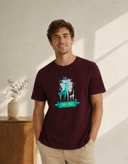Man wearing a maroon t-shirt with a graphic design, standing in a bright room.