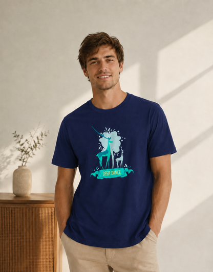 Man wearing a navy blue t-shirt with a graphic design, standing in a bright room.