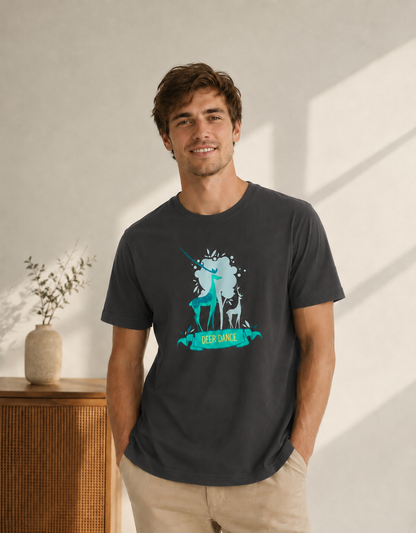Man wearing a dark gray t-shirt with a graphic design of a horse and text, standing in a room with a wooden cabinet and decorative items.