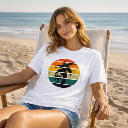 Woman wearing a white t-shirt with a colorful graphic on a beach