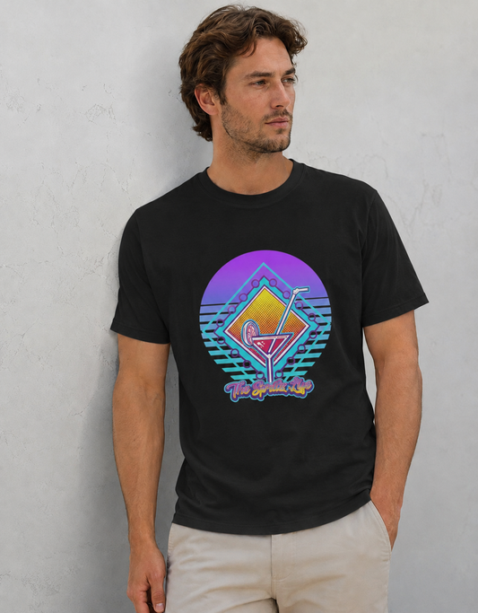 Man wearing a black t-shirt with a colorful graphic design against a gray background