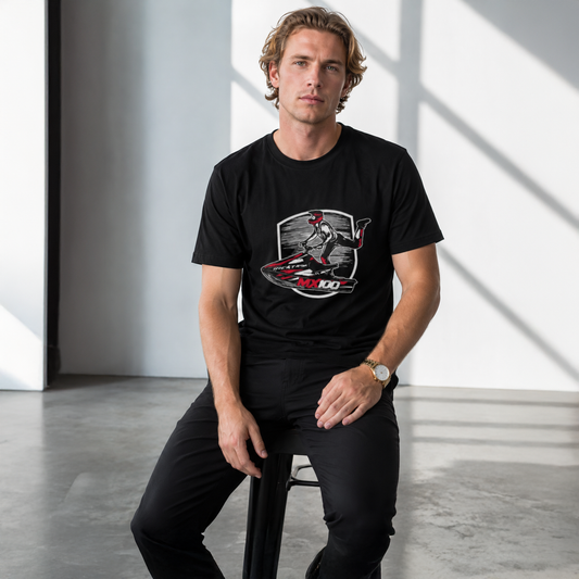 Man wearing a black t-shirt with a graphic design sitting on a stool.