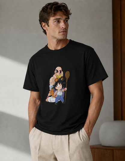 Man wearing a black t-shirt with a graphic design of animated characters.